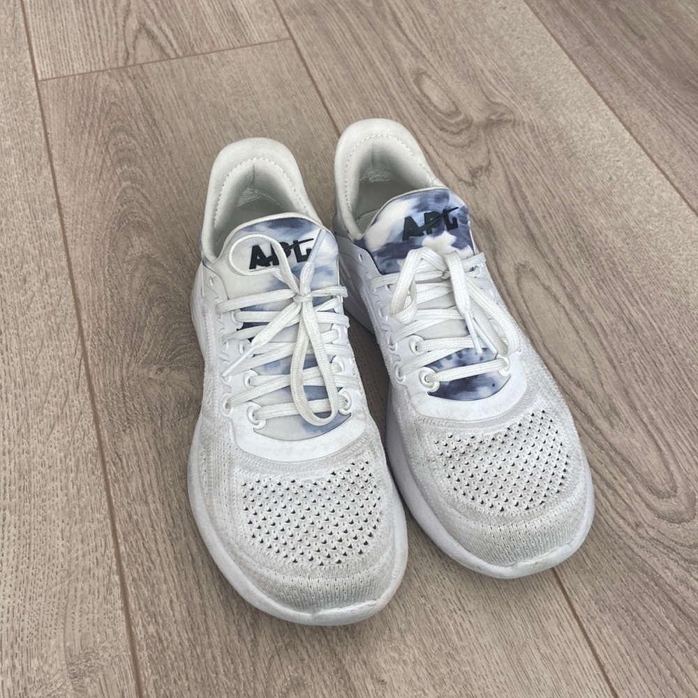 APL running shoes in a size 6. White with blue tie dye on the front and back.